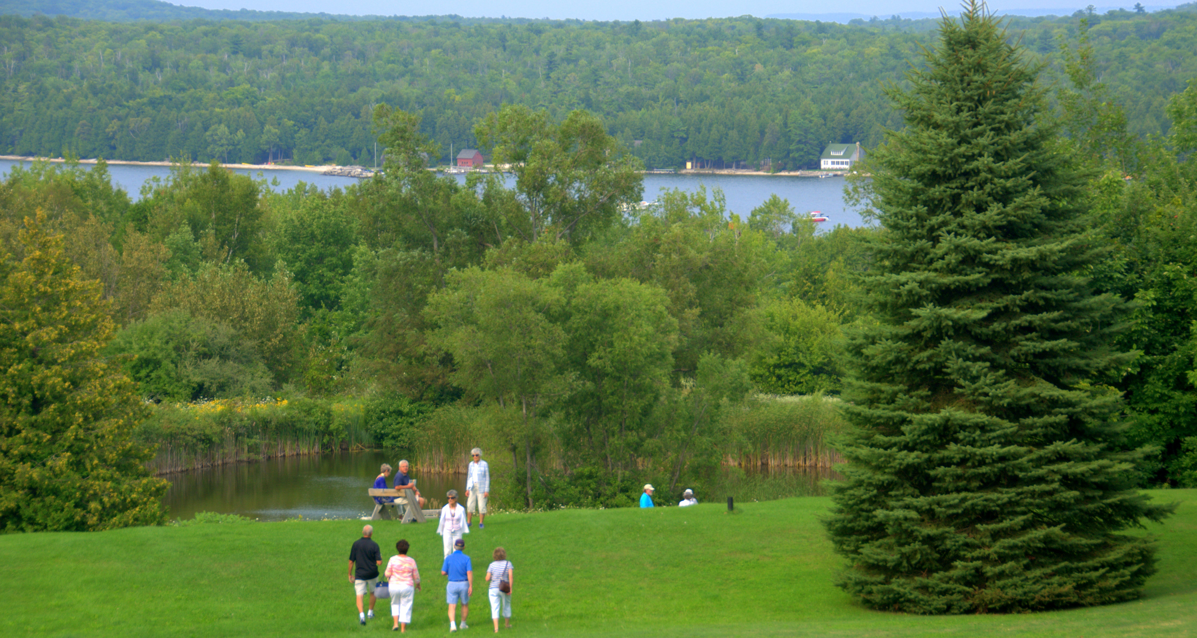 Guests stroll through the Grnad View Park during Annual Gathering.  Photo by David Harsh