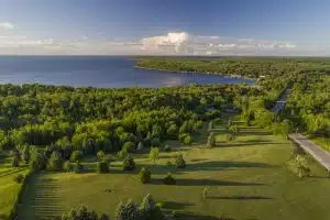 An aerial view from the top of Grand View Scenic Park shows the forested tree tops of the newly protected property below.  Photo by Dan Eggert